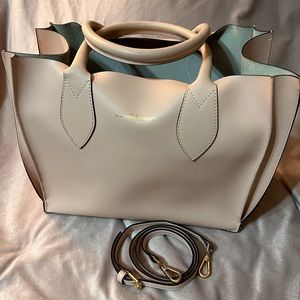 Pale pink Russell and Bromley handbag. Only used once.